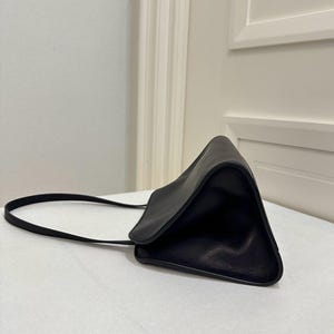 quiet luxury purse
old money handbag
modern heritage bag
subtle luxury leather bag
understated designer purse
timeless capsule handbag
clean aesthetic leather bag
luxury minimalist clutch
elevated everyday purse
classic black investment bag
effortless chic handbag
discreet luxury purse
Paris fashion style bag
runway inspired handbag
modern elegance purse