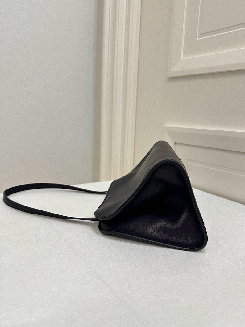 quiet luxury purse
old money handbag
modern heritage bag
subtle luxury leather bag
understated designer purse
timeless capsule handbag
clean aesthetic leather bag
luxury minimalist clutch
elevated everyday purse
classic black investment bag
effortless chic handbag
discreet luxury purse
Paris fashion style bag
runway inspired handbag
modern elegance purse