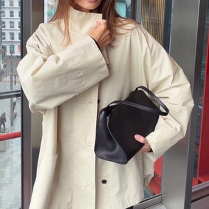 small black leather handbag women
structured black leather purse
mini leather shoulder bag black
elegant black leather handbag women
modern minimalist leather bag
top handle black leather bag
luxury black leather shoulder bag
sleek structured leather handbag
everyday black leather purse women
leather purse
shoulder purse
handbag women
mini purse
black purse
top handle purse
going out bag
everyday purse
leather handbag
shoulder handbag
ladies leather bag
small handbag
black bag
evening handbag