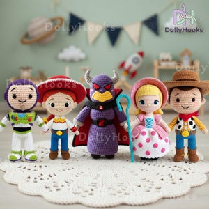 May include: A collection of five handmade crochet dolls, each representing a character from the animated film "Toy Story." The dolls include Buzz Lightyear, Jessie, Emperor Zurg, Bo Peep, and Woody, all standing on a white lace doily.