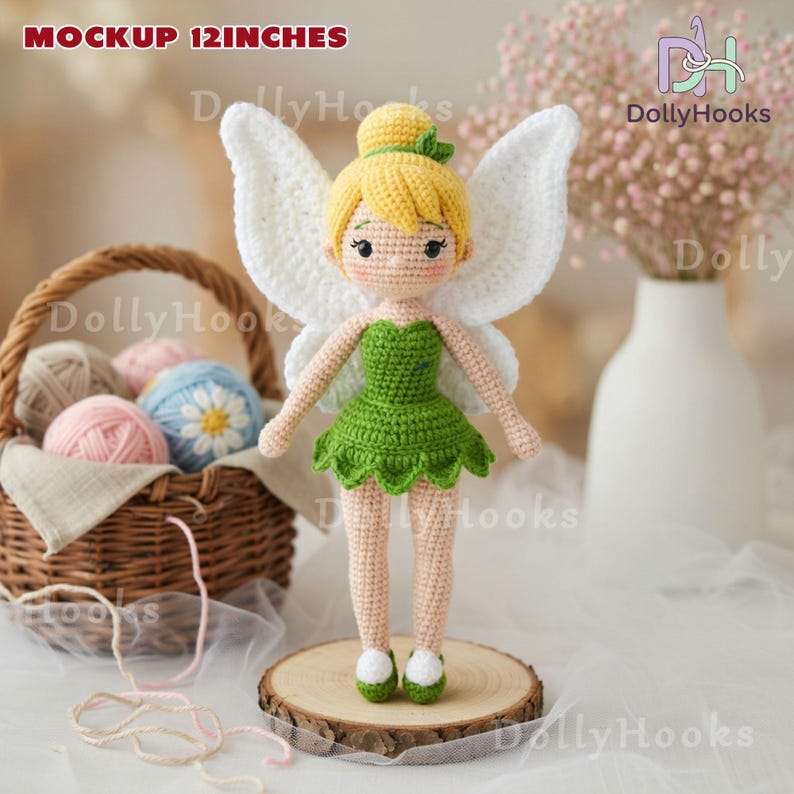 May include: A handmade crochet fairy doll, approximately 12 inches tall, with blonde hair, green dress, and white wings. The doll is standing on a wooden slice. The text "MOCKUP 12 INCHES" is visible in the image.