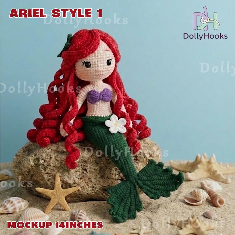 May include: A crocheted mermaid doll, "Ariel Style 1", with red hair, a purple top, and a green tail. The doll is approximately 14 inches tall and is decorated with a white flower. The doll is sitting on a rock with seashells and a starfish.