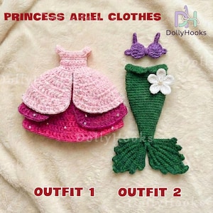 May include: Crocheted Princess Ariel clothes, including a pink and magenta dress and a mermaid outfit with a green tail and purple top. The outfits are handmade and feature the text "Outfit 1" and "Outfit 2".