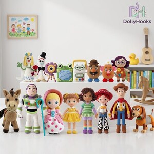 May include: A collection of crocheted dolls and figures including characters like a space ranger, a cowgirl, a cowboy, a horse, a dog, a potato-shaped figure, a frog, a camera, and various human-like dolls arranged on a white surface.