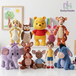 May include: A collection of nine crocheted stuffed toys featuring characters including a yellow bear in a red shirt, a pink pig, an orange tiger, a blue donkey, a purple elephant, a brown kangaroo, a small brown joey, an owl, and a boy.