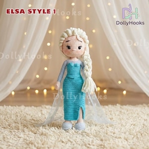 May include: A handmade crochet doll in the style of Elsa from Frozen. The doll has a light blue dress, a long white braid, and is standing on a white rug. The text "ELSA STYLE 1 Hooks" and "DollyHooks" are visible.