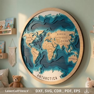 May include: A circular wooden world map wall art piece featuring layered blue ocean depths and light wood continents. The map includes engraved country names and labels for major regions like Russia, China, Brazil, USA, Canada, and Antarctica.