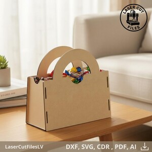 May include: A light brown wooden tote bag filled with colorful wrapped candies. The tote has a rectangular base, arched handles, and cut-out details. The text "Laser Cut Files" is in a circle on the top right. The text "LaserCutFilesLV" is at the bottom left.