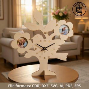 May include: A wooden tree-shaped clock with a bird silhouette and two flower-shaped photo frames. The clock has black hands and the numbers 12, 3, 6, and 9. The clock is on a round wooden table. The image also includes the text "LASER CUT FILES".