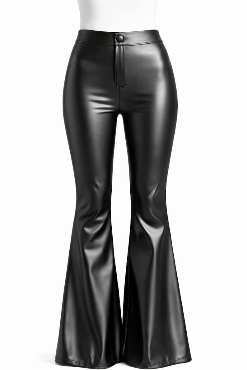 May include: Black faux leather flared pants with a high waist and button closure. The pants have a sleek, shiny finish and a wide leg opening, creating a retro silhouette. A classic, versatile garment.