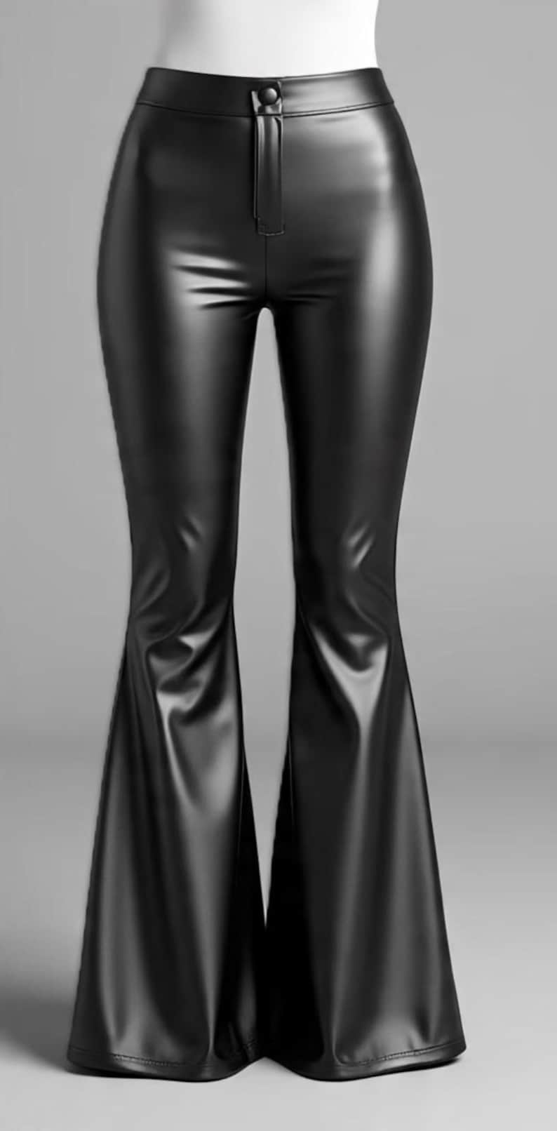 May include: Black faux leather flared pants. The pants have a high waist and a button closure. The legs flare out from the knee down. The material has a shiny appearance.