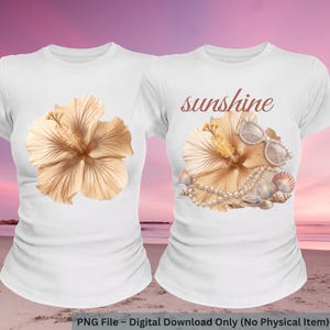 May include: Two white t-shirts with a hibiscus flower design. One shirt features a single flower, while the other has the word "sunshine" above the flower, along with sunglasses, seashells, and a pearl necklace. The shirts are displayed on a beach.