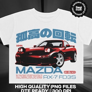 May include: A white t-shirt featuring a graphic of a red Mazda RX-7 FD3S sports car. The design includes blue Japanese text, the year 1991, the text MAZDA RX-7 FD3S, 13B-REW, and a paragraph of English text. A circular badge reads Original Design by Segi Empat.