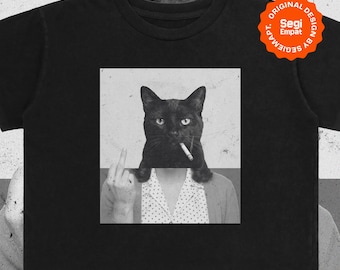 May include: A black t-shirt featuring a graphic print of a black cat with a cigarette in its mouth, wearing a collared shirt with a polka dot pattern. The cat is shown making a middle finger gesture with one paw. The text Segi Empat is visible.