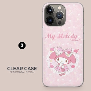 May include: A clear phone case with a pink floral design and a My Melody graphic. The case features a cartoon character in a pink dress and bow, surrounded by roses. The text "CLEAR CASE FRAGMENTAL DESIGN" is also visible.