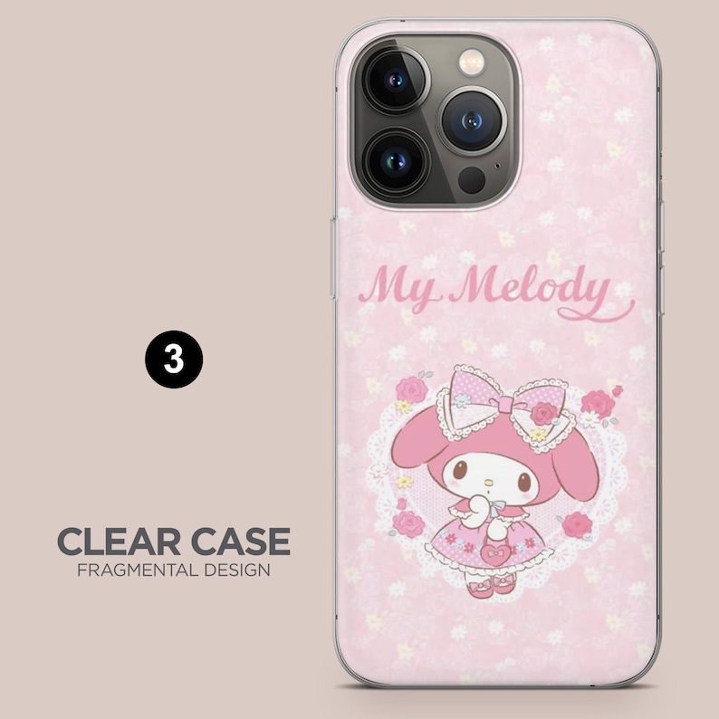 May include: A clear phone case with a pink floral design and a My Melody graphic. The case features a cartoon character in a pink dress and bow, surrounded by roses. The text "CLEAR CASE FRAGMENTAL DESIGN" is also visible.