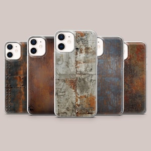 May include: A collection of five phone cases with a distressed metal texture design. The cases feature a variety of colors, including rust, gray, and blue, with visible rivets and weathered patterns. The cases are designed to fit a smartphone.