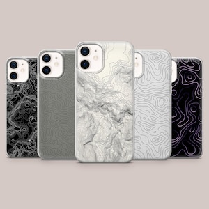 May include: Five phone cases with topographic map designs. The cases feature a variety of patterns in black, gray, and white. The cases are made of a clear material and have a glossy finish.