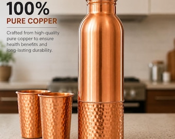 May include: A metallic copper water bottle with a smooth upper section and a hammered lower section, accompanied by two matching hammered copper cups. The text 100% PURE COPPER is visible, along with text describing the material and durability.