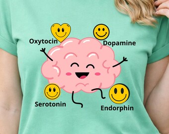 A T-shirt featuring the happiness hormones: dopamine, serotonin, oxytocin, and endorphins, gift for a psychologist or endocrinologist