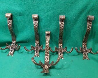 2 different clothes hooks Gothic brass