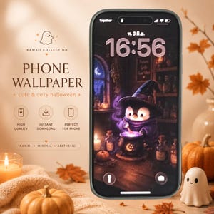 May include: A smartphone displaying a digital wallpaper featuring a small penguin wearing a witch hat and robe, stirring a glowing purple potion in a cauldron. The screen shows the time 16:56 and text in a non-Latin script at the top.