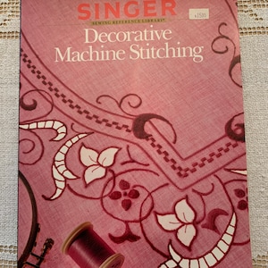 Verkauf! Dekorative Stickmaschine, Stickbuch War 11.00