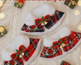 May include: Plaid Christmas dog scarves with white faux fur trim. Each scarf features a red and green plaid pattern, a red bow with gold bells, and a Christmas tree applique. The image includes gift boxes.