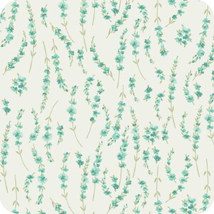 May include: A seamless pattern featuring light blue floral sprigs with small blossoms and green stems scattered across a cream-colored background. The design has a watercolor effect, creating a soft, delicate aesthetic.