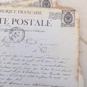 May include: A vintage postcard with a faded, handwritten message in French. The postcard features a stamp with the words "Republique Francaise" and "La Poste".