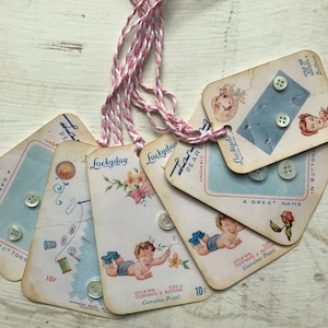 May include: A collection of vintage button cards with illustrations of babies and flowers. The cards are printed with the text "Luckyday Pearl" and "Genuine Pearl". Each card features a different style of button and includes the size and quantity of buttons included. The cards are priced at 10 cents each.
