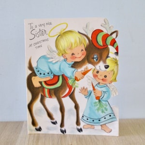 Renna vintage cartolina di Natale con angioletti