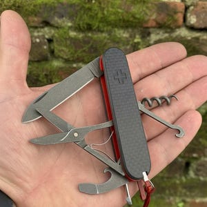Custom Victorinox Compact | Carbon Fiber Scales | Red G10 Liners