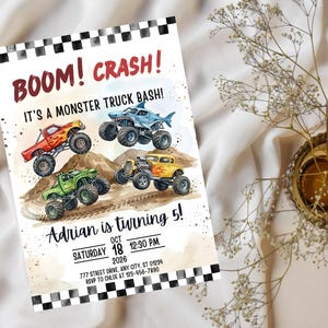 May include: A party invitation with the text "BOOM! CRASH!" and "IT'S A MONSTER TRUCK BASH!". The invitation features illustrations of monster trucks in red, blue, green, and yellow. The text "Adrian is turning 5!" is also included.