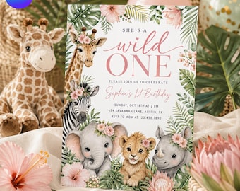 May include: A rectangular birthday invitation card featuring illustrations of a giraffe, zebra, elephant, lion cub, and rhino adorned with pink flowers and tropical leaves. The text reads: SHE'S A wild ONE PLEASE JOIN US TO CELEBRATE Sophie's 1st Birthday.