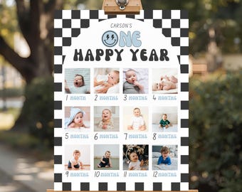 Könnte beinhalten: Eine rechteckige Meilenstein-Fototafel mit schwarz-weißem Schachbrettmuster am Rand. Der Text lautet Carson's ONE HAPPY YEAR mit einem Blitz-Smiley. Sie zeigt zwölf einzelne Babyfotos, beschriftet von 1 bis 12 Monaten.