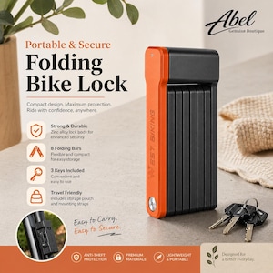 Peut inclure: Un antivol pliable pour vélo noir et orange avec le texte "WEST BIKING" sur le côté. Le cadenas est présenté avec trois clés. Le texte sur l'image indique "Portable & Secure Folding Bike Lock".