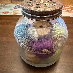 Vintage jar with 13 spools of vintage crochet thread