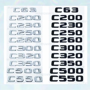 May include: A selection of car model badges in chrome and black, featuring models such as C63, C200, C230, C250, C260, C300, C320, C350, C500, and C550. The badges are arranged in rows, with chrome on the left and black on the right.