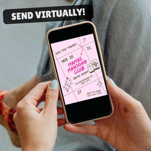 May include: A smartphone displaying a digital invitation for Mamas Mahjong Club game night on a light pink calendar background. The text includes "SEE YOU THERE!", "NOV 20", "MAMAS MAHJONG CLUB", "GAME NIGHT", "123 ANYWHERE ST.. ANY CITY", and "RSVP TO MARY 123-456-7890".