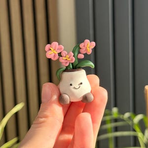 Handgjord blomkruka av polymerlera