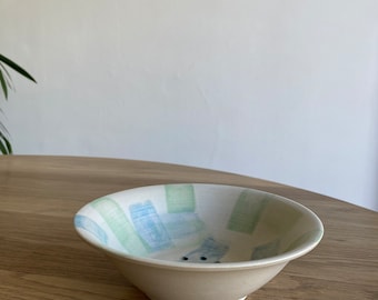 Handmade Ceramic stoneware berry bowl with pale blue and green brush design.