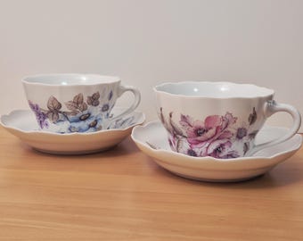 Juego de 4 tazas de té Hutschenreuther pintadas a mano con motivos florales.