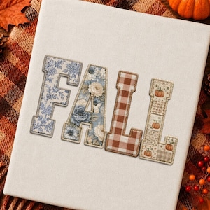 May include: A white rectangular canvas featuring the word FALL in large block letters. The F has a blue floral pattern, the A features blue roses, the L is brown and white checkered, and the L displays a grid of small pumpkins.