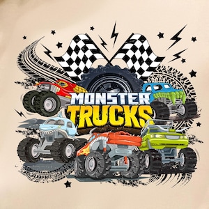 May include: Beige sweatshirt featuring a colorful graphic of monster trucks. The design includes five trucks in red, blue, green, orange, and light blue, with the words "Monster Trucks" in yellow. Black tire tracks, lightning bolts, and checkered flags complete the design.