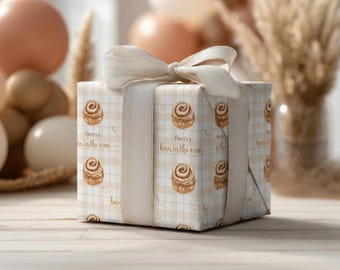 Papel de regalo para baby shower con bollo al horno