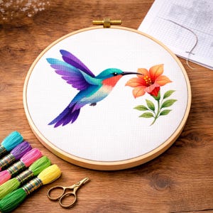 May include: A set of three ceramic nesting bowls in shades of blue, green, and white. The bowls have a speckled glaze and a simple, modern design. The largest bowl is approx. 15 cm in diameter.