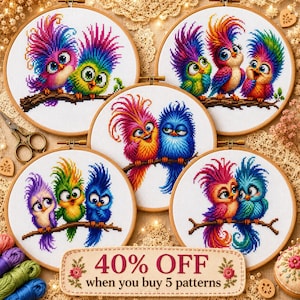 May include: Five circular wooden embroidery hoops containing cross-stitch patterns of colorful, whimsical birds with spiky crests perched on branches. A rectangular sign at the bottom reads 40% OFF when you buy 5 patterns, decorated with small floral motifs.