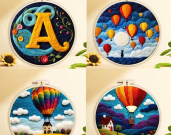 May include: Four embroidery hoops with colorful felt wool designs. The designs include a hot air balloon, a letter A, and a house with a hot air balloon.