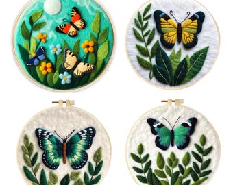 May include: Four embroidery hoops with felt backgrounds and colorful butterfly designs. Each hoop features a different butterfly species with green foliage.